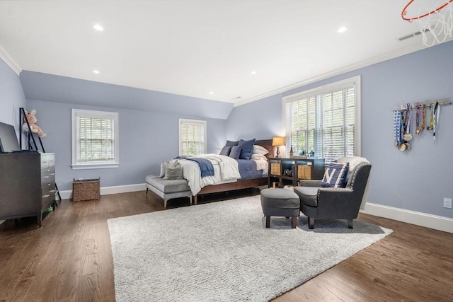 bedroom featuring crown molding, baseboards, wood finished floors, and recessed lighting