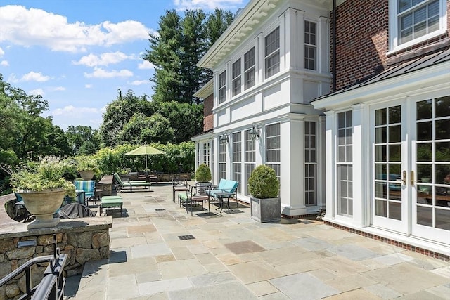 29 Willard Cmn, Concord, MA 01742 - view of patio / terrace featuring french doors and outdoor dining space