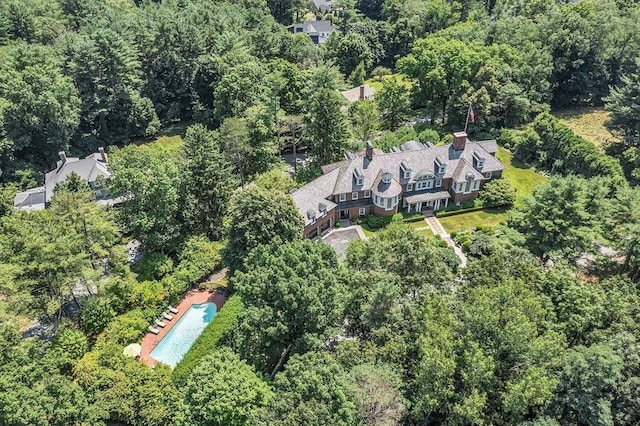 29 Willard Cmn, Concord, MA 01742 - aerial view of property and surrounding area with a pool and a heavily wooded area