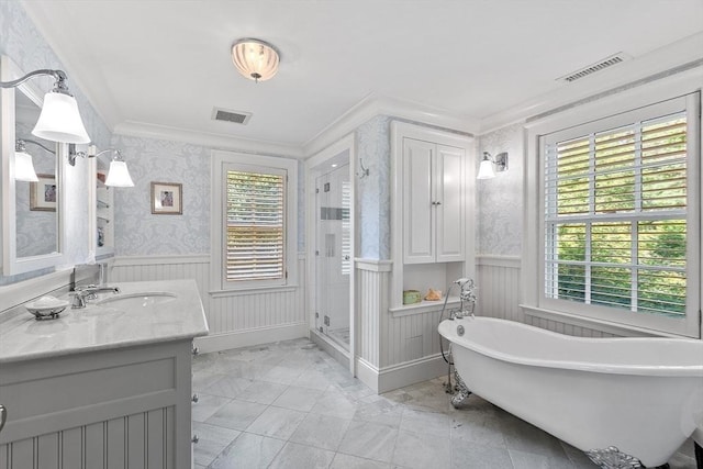 29 Willard Cmn, Concord, MA 01742 - bathroom featuring crown molding, vanity, a shower stall, a freestanding bath, and a wainscoted wall