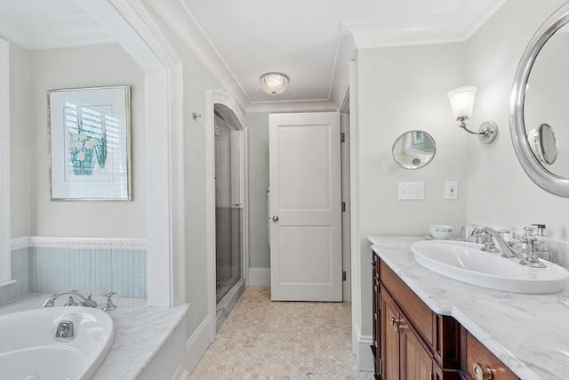 29 Willard Cmn, Concord, MA 01742 - full bath featuring vanity, a tub with jets, a shower stall, baseboards, and ornamental molding