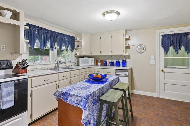 49 Winchendon Rd, Templeton, MA 01436 - kitchen with open shelves, white appliances, light countertops, and backsplash