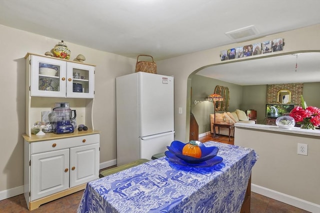 49 Winchendon Rd, Templeton, MA 01436 - dining space featuring arched walkways and baseboards