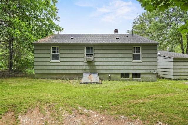 49 Winchendon Rd, Templeton, MA 01436 - rear view of property featuring a lawn, roof with shingles, cooling unit, and a chimney