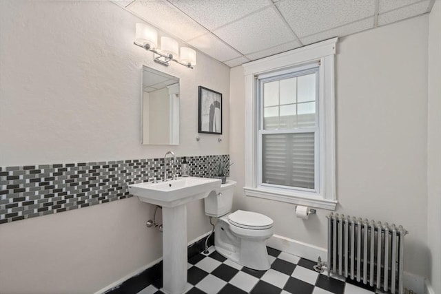52 Myrtle St, Newton, MA 02465 - bathroom with radiator, tile patterned floors, and a drop ceiling
