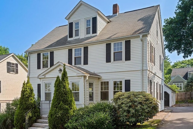 52 Myrtle St, Newton, MA 02465 - view of front facade with a chimney