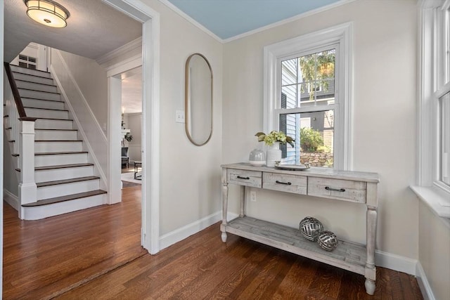 52 Myrtle St, Newton, MA 02465 - foyer entrance featuring dark wood finished floors, crown molding, and stairs