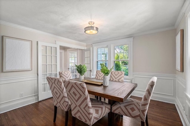52 Myrtle St, Newton, MA 02465 - dining space featuring dark wood-type flooring, healthy amount of natural light, crown molding, and a decorative wall