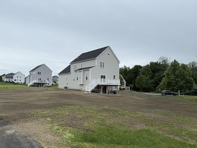 87 Magill Dr, Grafton, MA 01519 - back of property featuring stairs and a wooden deck