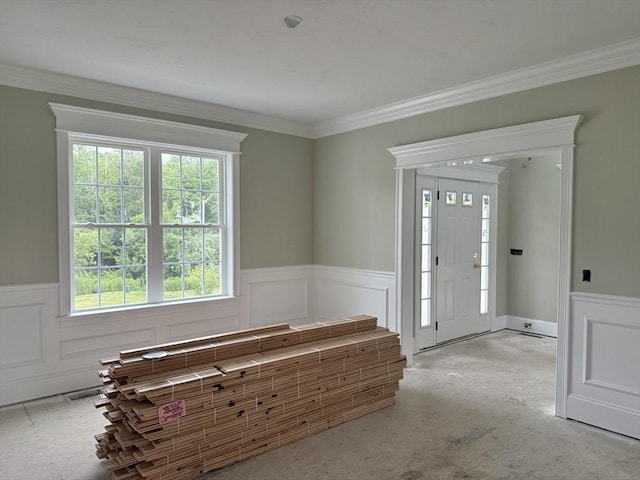 87 Magill Dr, Grafton, MA 01519 - entrance foyer featuring wainscoting, a decorative wall, and crown molding