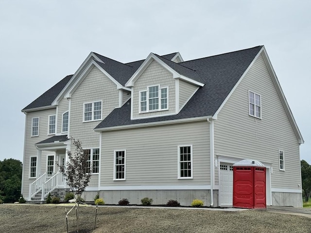 87 Magill Dr, Grafton, MA 01519 - view of front of home with a garage and a shingled roof
