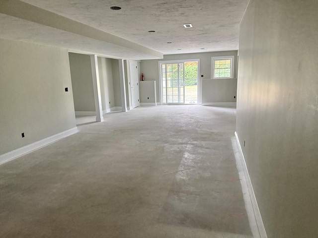 87 Magill Dr, Grafton, MA 01519 - empty room with concrete floors and baseboards
