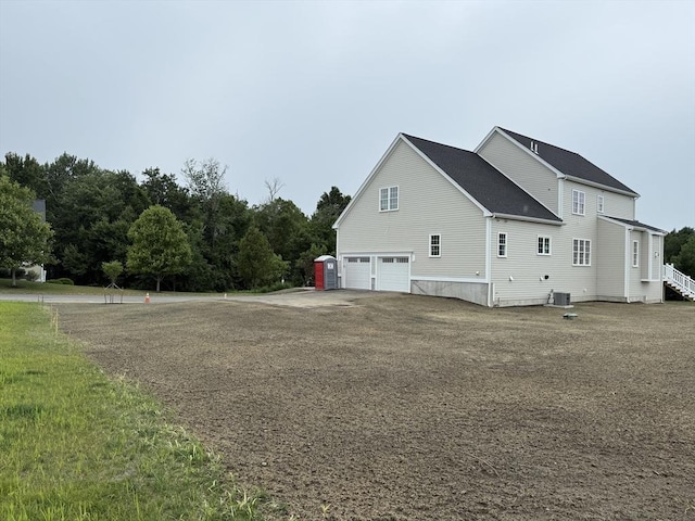 87 Magill Dr, Grafton, MA 01519 - view of property exterior with an attached garage and driveway