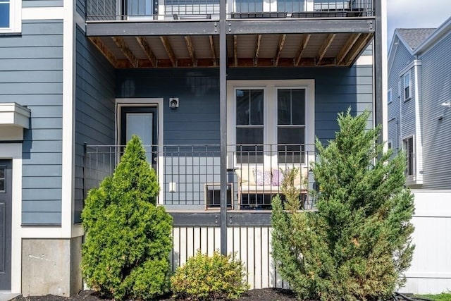 doorway to property featuring a balcony