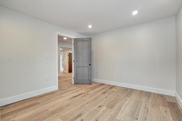 unfurnished room featuring light wood-type flooring