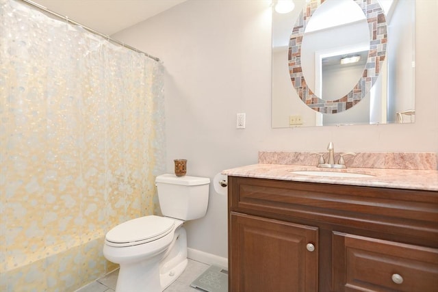 bathroom with toilet, vanity, tile patterned floors, and curtained shower