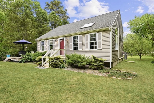 1 Fellowship Cir, Wareham, MA 02576 - view of front facade featuring a shingled roof, a front lawn, and a deck