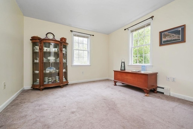 1 Fellowship Cir, Wareham, MA 02576 - carpeted office space featuring a baseboard radiator, plenty of natural light, baseboards, and lofted ceiling