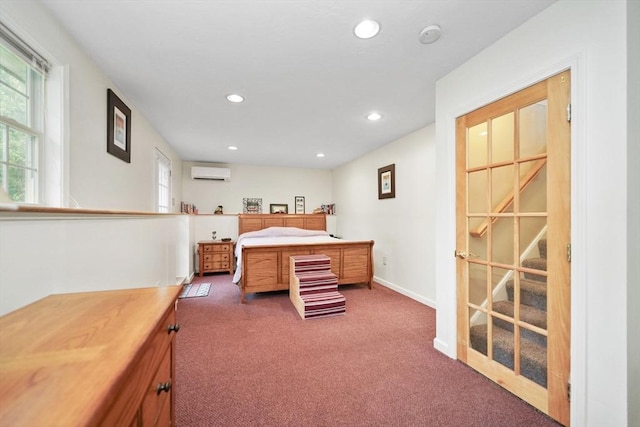 1 Fellowship Cir, Wareham, MA 02576 - carpeted bedroom with an AC wall unit, recessed lighting, and baseboards