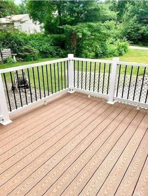 deck featuring a yard