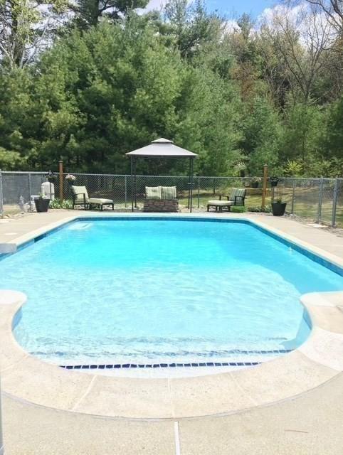 view of pool with fence and a fenced in pool