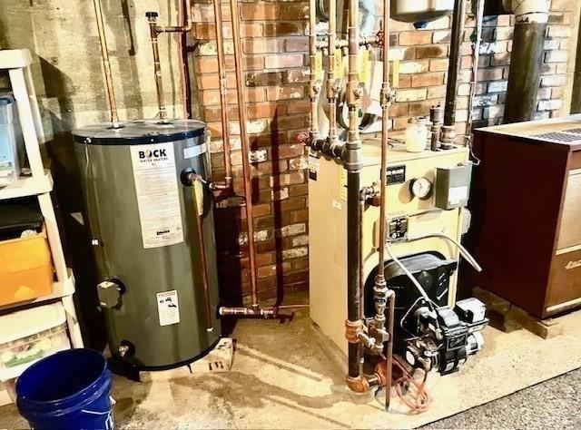 utilities with water heater and a heating unit