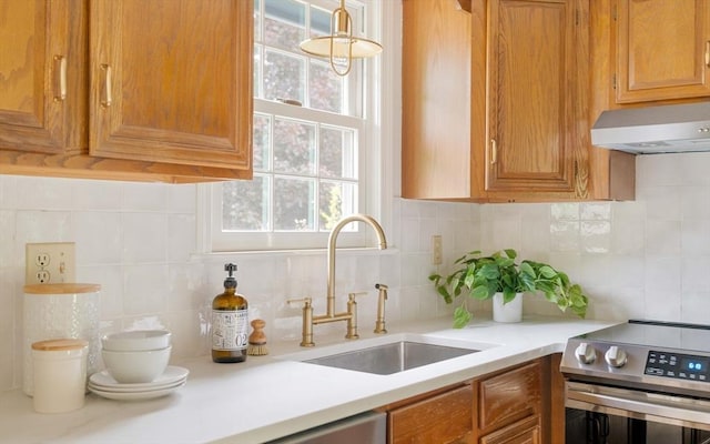 50 Hillside Rd, Tewksbury, MA 01876 - kitchen featuring a sink, electric range, under cabinet range hood, and tasteful backsplash