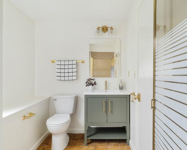 50 Hillside Rd, Tewksbury, MA 01876 - bathroom featuring vanity, toilet, baseboards, and tile patterned floors