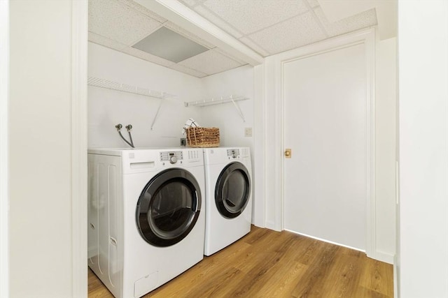 50 Hillside Rd, Tewksbury, MA 01876 - laundry room featuring washer and clothes dryer and light wood finished floors