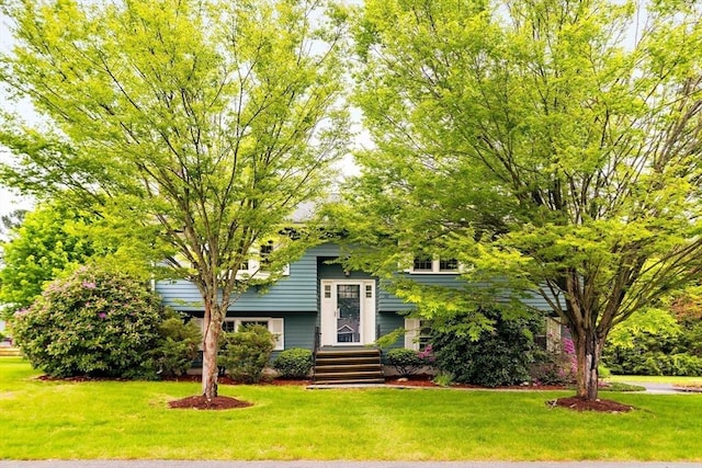 50 Hillside Rd, Tewksbury, MA 01876 - view of front facade featuring a front yard