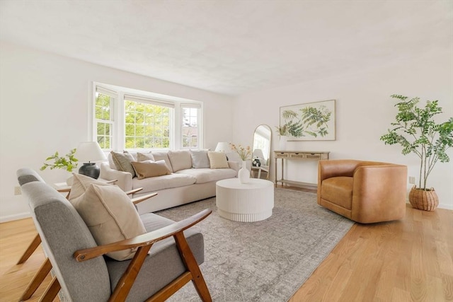 50 Hillside Rd, Tewksbury, MA 01876 - living area featuring light wood-type flooring and baseboards