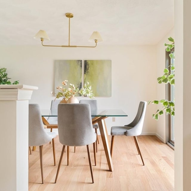50 Hillside Rd, Tewksbury, MA 01876 - dining room with light wood-style floors and baseboards