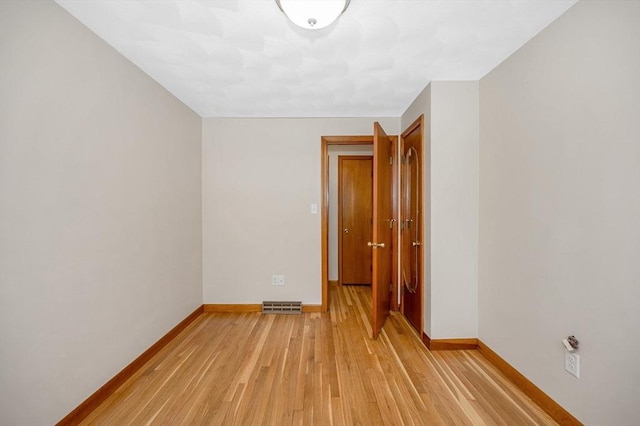 empty room featuring light hardwood / wood-style flooring