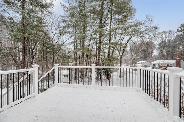 view of snow covered deck