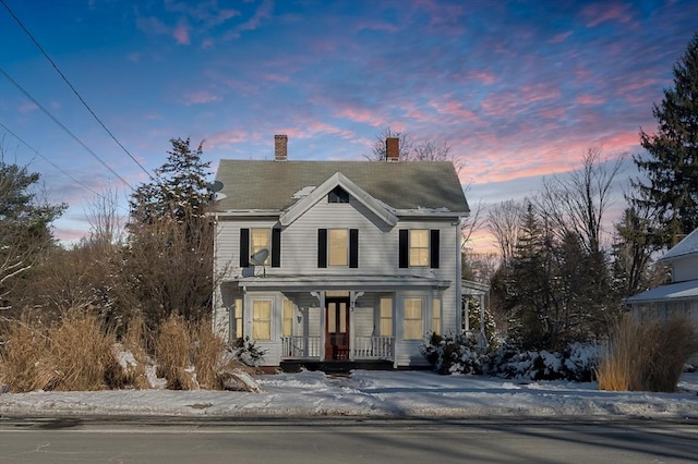 view of front of property featuring covered porch