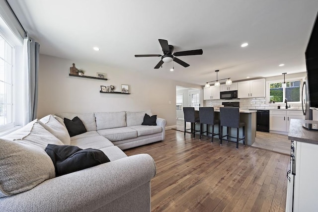 45 Weyham Rd, Weymouth, MA 02191 - living area with light wood-style flooring, a ceiling fan, recessed lighting, and baseboards