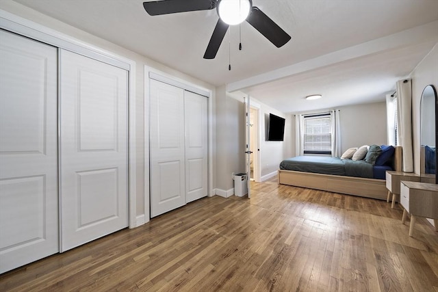 45 Weyham Rd, Weymouth, MA 02191 - bedroom featuring multiple closets, wood finished floors, ceiling fan, and baseboards