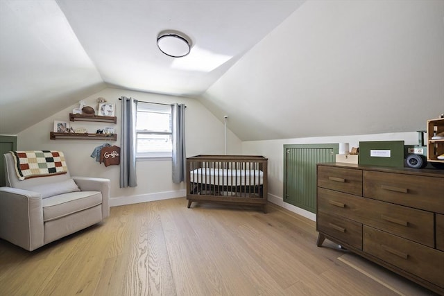 45 Weyham Rd, Weymouth, MA 02191 - bedroom with light wood-style flooring, vaulted ceiling, and baseboards
