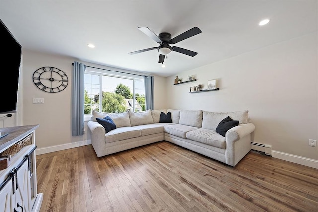 45 Weyham Rd, Weymouth, MA 02191 - living area with a baseboard radiator, light wood-style flooring, ceiling fan, baseboards, and recessed lighting