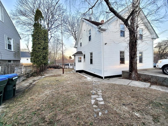 view of property exterior at dusk