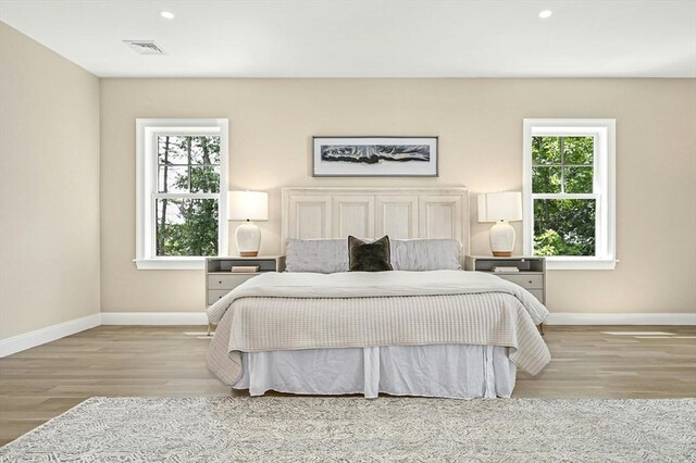 bedroom featuring light wood-type flooring