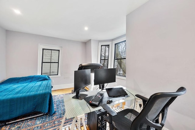 30 Howard St, Cambridge, MA 02139 - bedroom featuring multiple windows, wood finished floors, an office area, baseboards, and recessed lighting