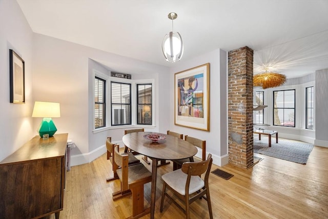 30 Howard St, Cambridge, MA 02139 - dining area featuring baseboards and light wood-style floors