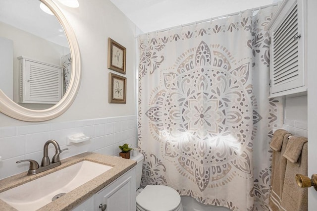 10 Woodcrest Ct Unit 6, Weymouth, MA 02190 - full bath with toilet, tile walls, vanity, a shower with shower curtain, and wainscoting