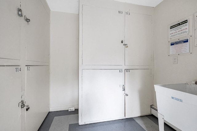 10 Woodcrest Ct Unit 6, Weymouth, MA 02190 - laundry area with a sink
