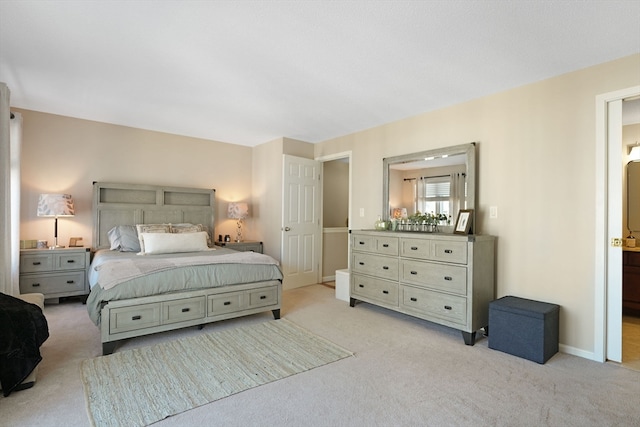 bedroom featuring light colored carpet