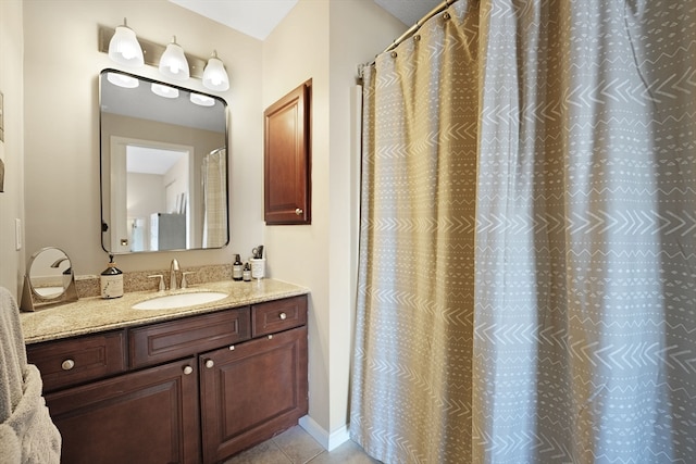 bathroom featuring vanity and tile patterned floors