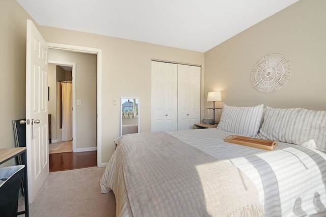 bedroom with light colored carpet