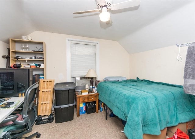 bedroom with a ceiling fan, carpet flooring, and vaulted ceiling