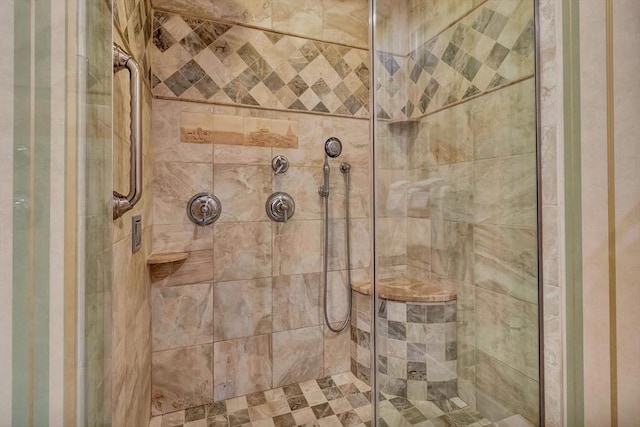 bathroom with a shower stall